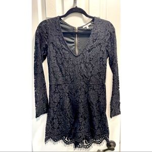 Black, size Small, never worn, lace, long sleeve romper.